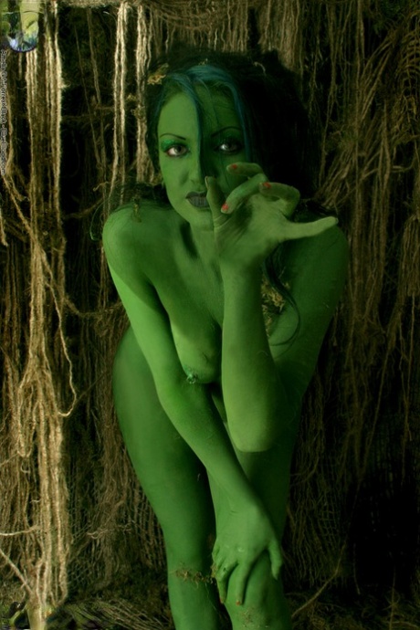 Solo girl with green skin wanders around the woods with no clothes on 69028544