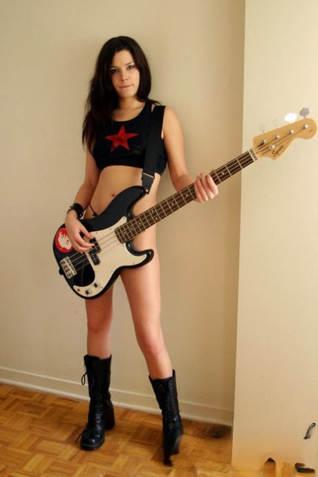 Tattooed young amateur rock star Ravon performs in sexy black thong 20458863