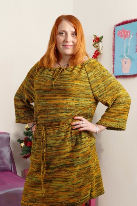 Thick redheaded housewife satisfies her ginger pussy with a sex toy on a sofa 93370523