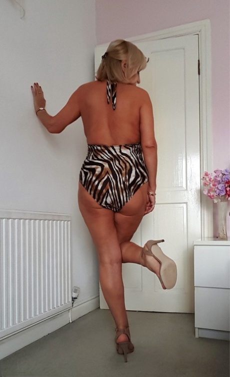 Chubby mature lady shows her big naturals and pussy for the first time 83911824