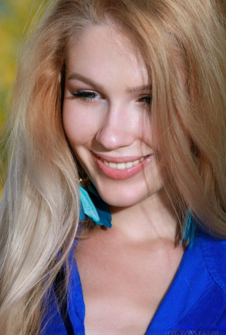 Tall teen Genevieve Gandi slips off robe and panties to pose nude on dirt path 87134421