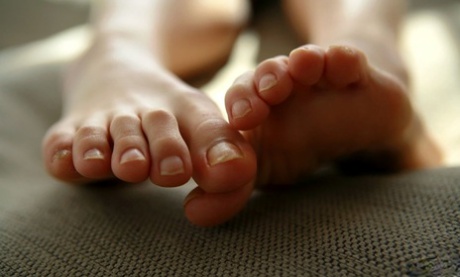 Japanese teen Momo Yoshizawa shows her pretty toes before getting bare naked 60911144