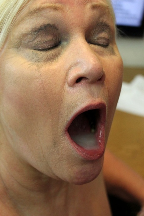 Big boobed granny sports a mouthful of cum after anal sex in her office 15019995