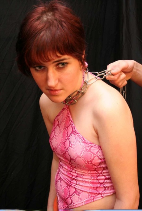 Redhead female is spanked after being covered in candle wax 73983921