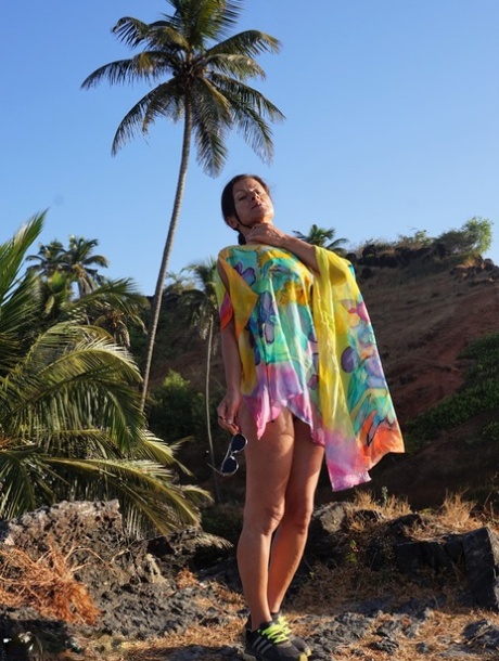 Older amateur Diana Ananta exposes her tits and ass while on a hike 27590858