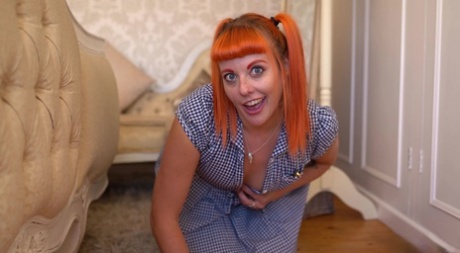 Natural redhead reveals her cleavage while cleaning a hardwood floor 53732102