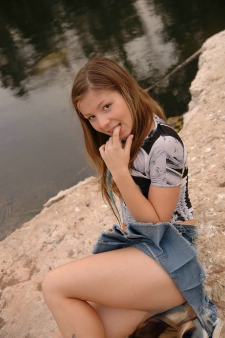 Charming young girl uncovers her tiny tits during upskirt action 15597903