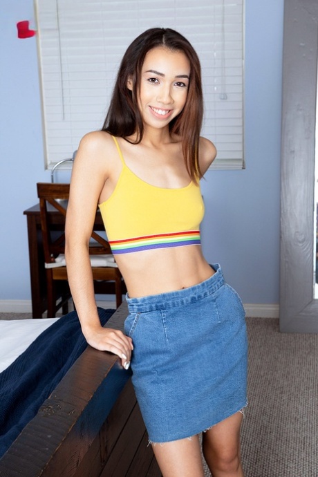 Slim teen Jackie Rogen strums a guitar before getting naked for a finger fuck 24050537