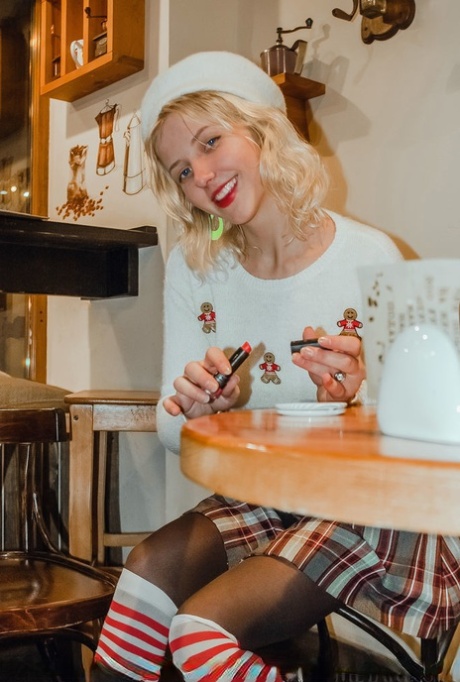Sweet blonde teen Jessika applies lipstick before getting naked in knee socks 45527981