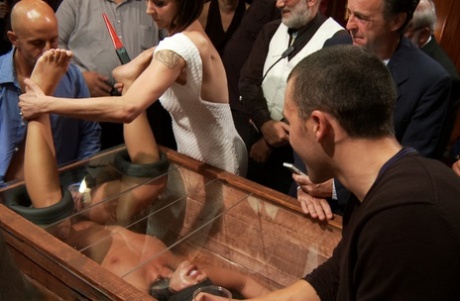 Naked girl is completely humiliated in front of a crowd of people 68907280