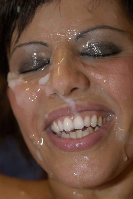 Latina slut Scarlett March gets her face covered in sperm during a gangbang 52143144