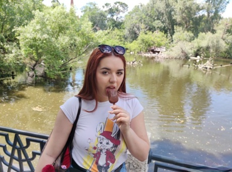 Redhead chubber Diana Rius eats a frozen treat outdoors before indoor POV sex 77772289