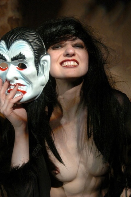 Dark-haired chick Irene exposes her natural tits at Halloween 63537138