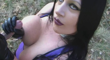 Dark haired MILF attends to the ball sac during a BJ in latex clothing 85494921