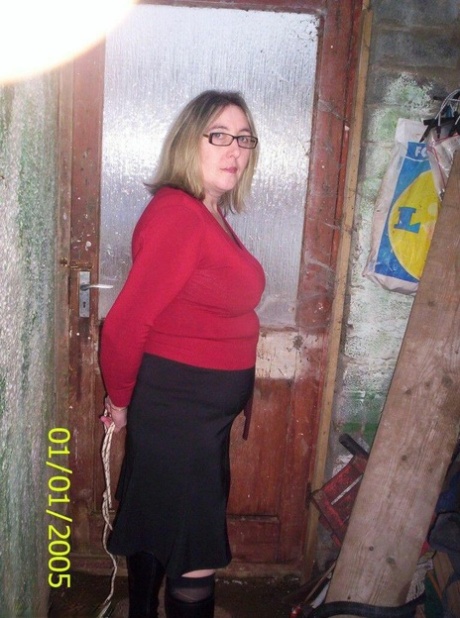 Caucasian female shows her natural tits while gagged and rope bound 23101492