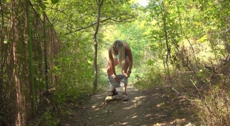Blonde chick gets caught taking a piss during a walk in nature 95543334