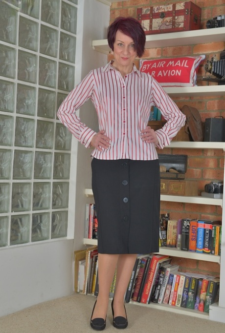 Older solo babe Penny Brooks striking sexy fully clothed poses 62260235