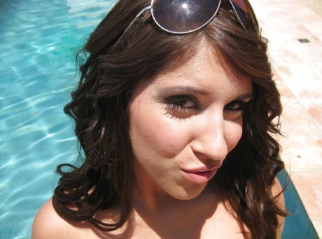 Pretty latina babe in sunglasses Miley Ann exposing her big tits outdoor 70458002